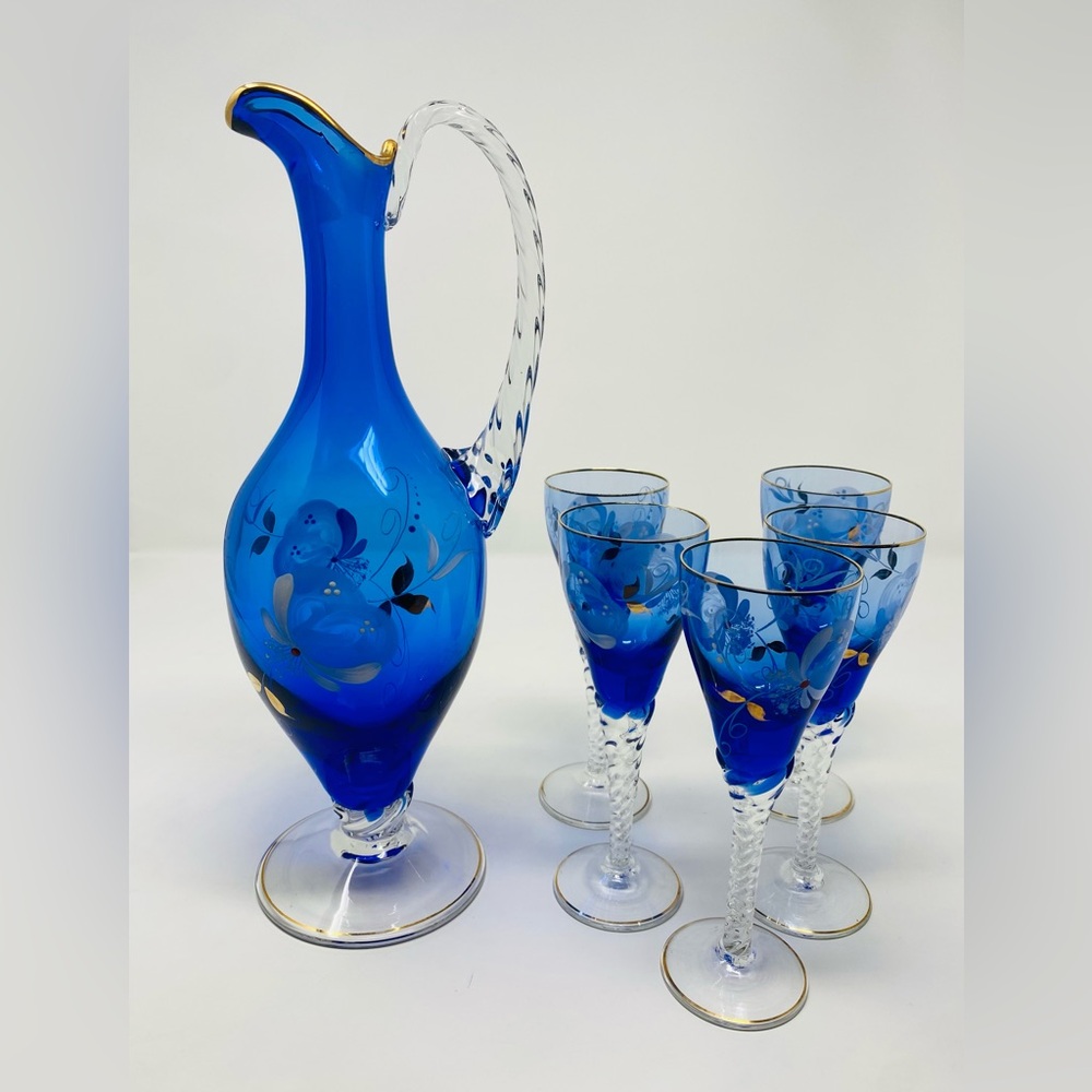 Elegant Blue Glass Pitcher and Goblet Set